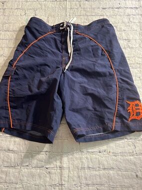 GENERAL MERCHANDISE DETROIT G-III APPAREL GROUP MENS NAVY/ORANGE SWIM TRUNKS  M